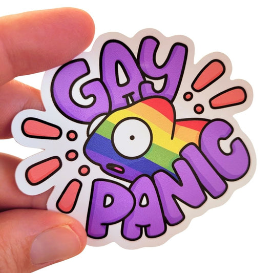 Sticker with 'Gay Panic' text and rainbow design held by a hand