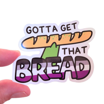 Sticker with bread graphic and text 'Gotta Get That Bread' held by a hand on a white background