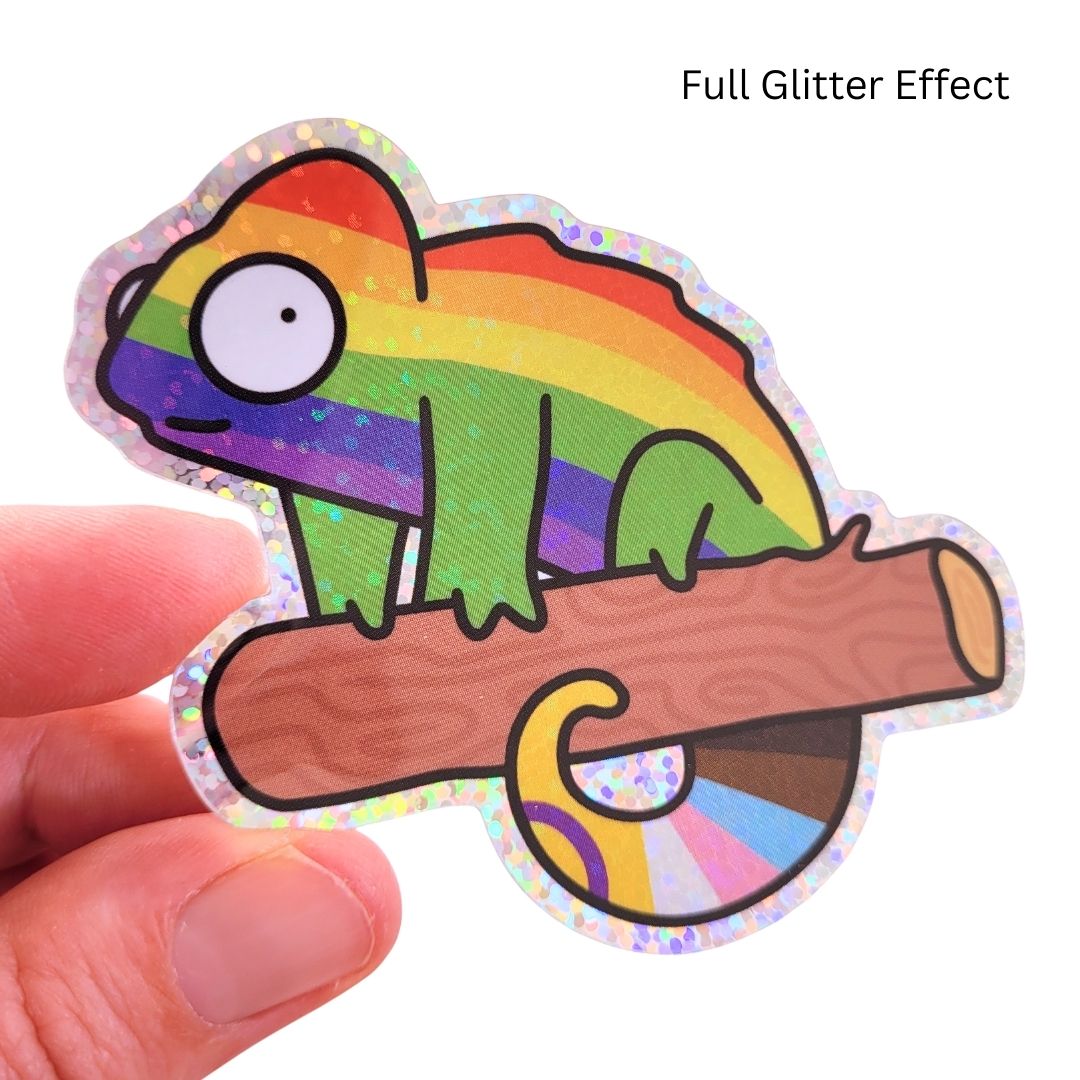 Colorful chameleon sticker with a full glitter effect held by a hand.