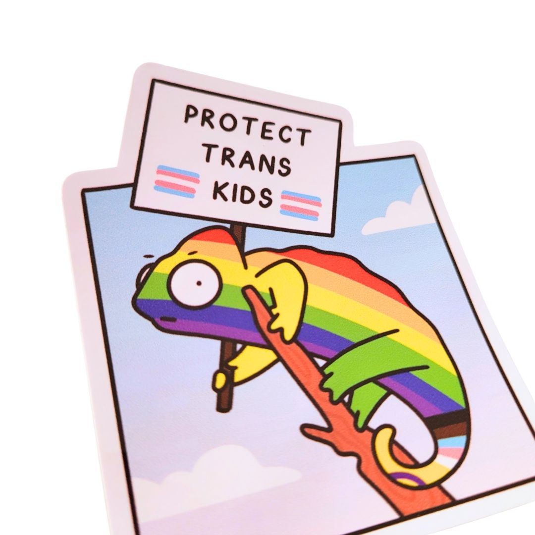 Cartoon rainbow chameleon holding a sign that says 'Protect Trans Kids' on a white background